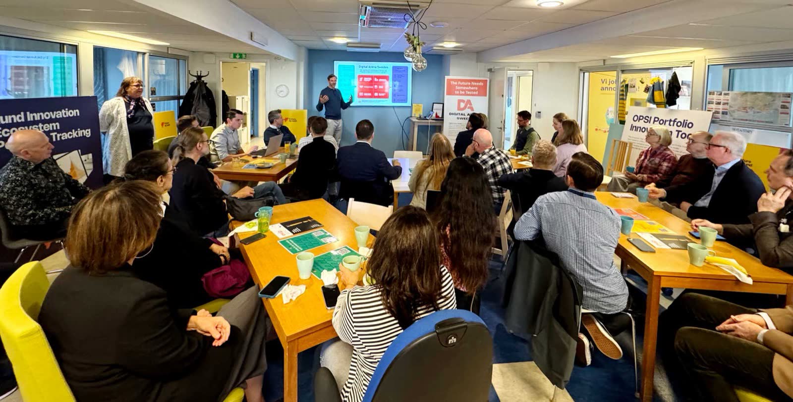 Members gathered around tables during a presentation at the Future by Lund member breakfast.